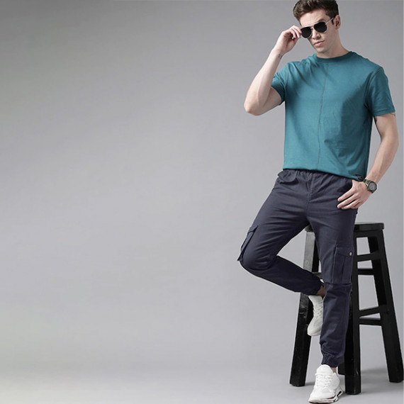 https://megashoppin.com/products/men-navy-blue-solid-mid-rise-woven-pure-cotten-cargo-trousers